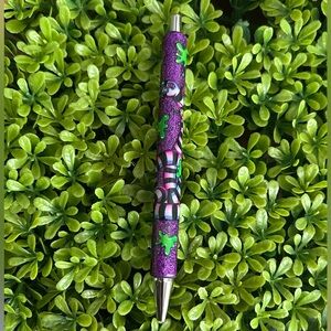 Beetlejuice glitter pen .